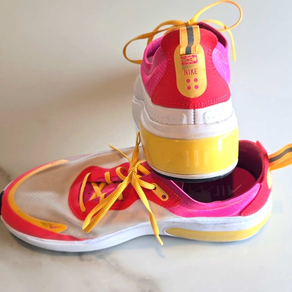Nike Pink and Yellow Athletic Shoes with Sleek Design - Picture 4 of 6